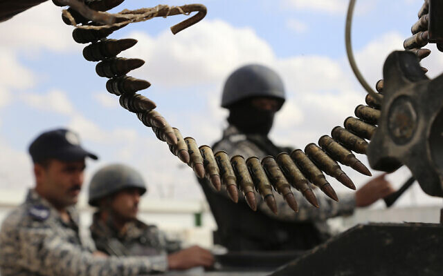Illustrative: Jordanian soldiers stand at the northeastern border with Syria, Feb. 14, 2017. (Raad Adayleh/AP) Illustrative: Jordanian soldiers stand at the northeastern border with Syria, Feb. 14, 2017. (Raad Adayleh/AP)