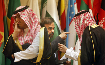 Illustrative: Then-director general of International Peace and Security Department at Iran's Foreign Ministry, Reza Najafi, center, talks to a Saudi protocol official during a group picture of leaders attending Islamic Summit of the Organization of Islamic Cooperation (OIC) in Mecca, Saudi Arabia, June 1, 2019. (AP Photo/Amr Nabil)