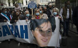 Protesters march with a banner of killed Jewish woman Sarah Halimi, during a demonstration in Marseille, southern France, April 25, 2021 (AP Photo/Daniel Cole)