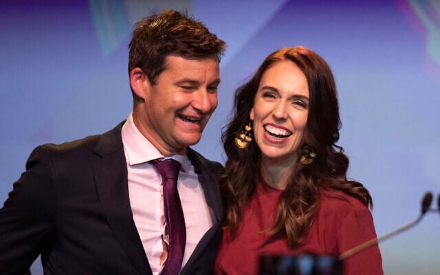 In this Oct. 17, 2020, file photo, New Zealand Prime Minister Jacinda Ardern, right, is congratulated by her partner Clarke Gayford following her victory speech to Labour Party members at an event in Auckland, New Zealand (AP Photo/Mark Baker, File) In this Oct. 17, 2020, file photo, New Zealand Prime Minister Jacinda Ardern, right, is congratulated by her partner Clarke Gayford following her victory speech to Labour Party members at an event in Auckland, New Zealand (AP Photo/Mark Baker, File)