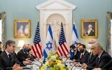 US Secretary of State Antony Blinken, left, accompanied by Israeli Foreign Minister Yair Lapid, right, speaks at bilateral meeting at the State Department in Washington, Oct. 13, 2021. (AP Photo/Andrew Harnik, Pool)