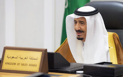 Saudi King Salman attends the G20 Leaders' Summit via videoconference at the royal palace in Riyadh, Saudi Arabia, October 30, 2021. (Bandar Aljaloud/ Saudi Royal Palace via AP)