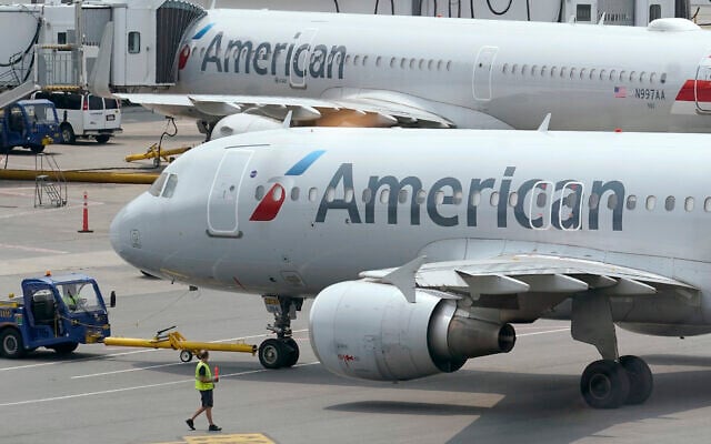 File: American Airlines passenger jets prepare for departure, July 21, 2021, near a terminal at Boston Logan International Airport. (AP Photo/Steven Senne) File: American Airlines passenger jets prepare for departure, July 21, 2021, near a terminal at Boston Logan International Airport. (AP Photo/Steven Senne)