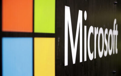 The Microsoft company logo is displayed at their offices in Sydney, Australia, on Wednesday, Feb. 3, 2021. (AP Photo/Rick Rycroft, File)