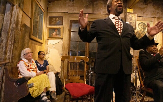 Sandra Jaffe, far left, who along with her husband, Allan, owned and managed Preservation Hall since the early 1960s, watches trombonist Freddie Lonzo sing to the crowd gathered June 10, 2021, in New Orleans, for the reopening of the venue since the coronavirus lockdown. (Chris Granger/The Times-Picayune/The Advocate via AP) Sandra Jaffe, far left, who along with her husband, Allan, owned and managed Preservation Hall since the early 1960s, watches trombonist Freddie Lonzo sing to the crowd gathered June 10, 2021, in New Orleans, for the reopening of the venue since the coronavirus lockdown. (Chris Granger/The Times-Picayune/The Advocate via AP)
