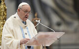 Pope Francis delivers his homely as he celebrates a Mass for the solemnity of St. Mary at the beginning of the new year, in St. Peter's Basilica, at the Vatican, on January 1, 2022. (AP Photo/Andrew Medichini)