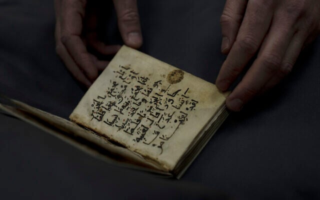 An early Quran, part of the collection of the National Library of Israel, is displayed at The Hebrew University campus in Jerusalem, January 6, 2022. (AP Photo/ Maya Alleruzzo) An early Quran, part of the collection of the National Library of Israel, is displayed at The Hebrew University campus in Jerusalem, January 6, 2022. (AP Photo/ Maya Alleruzzo)