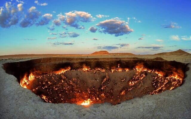 The crater fire named 'Gates of Hell' is seen near Darvaza, Turkmenistan, July 11, 2020. (AP Photo/Alexander Vershinin) The crater fire named 'Gates of Hell' is seen near Darvaza, Turkmenistan, July 11, 2020. (AP Photo/Alexander Vershinin)