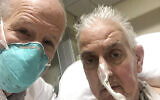 Dr. Bartley Griffith takes a selfie photo with patient David Bennett in Baltimore in January 2022. (Dr. Bartley Griffith/University of Maryland School of Medicine via AP)