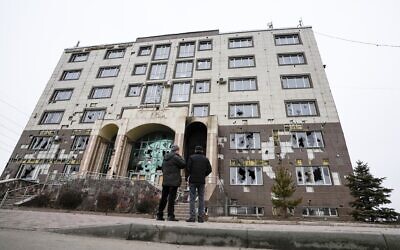 The building of Kazakhstan's ruling party The Nur Otan is seen with damage after clashes in Almaty, Kazakhstan, January 11, 2022. (AP Photo)