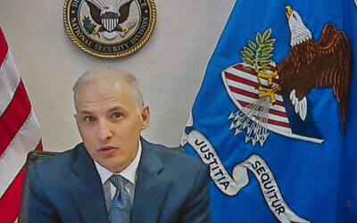 Assistant Attorney General for National Security Division Matthew Olsen, seen from a video monitor, testifies remotely before a US Senate Judiciary Committee during a virtual hearing to examine the domestic terrorism threat one year after January 6, on Capitol Hill, on January 10, 2022, in Washington, DC. (AP Photo/Manuel Balce Ceneta)