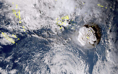 In this satellite image taken by Himawari-8, a Japanese weather satellite, and released by the agency, shows an undersea volcano eruption at the Pacific nation of Tonga, Jan. 15, 2022 (Japan Meteorology Agency via AP)