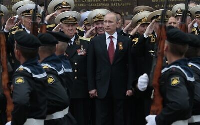 Russian President Vladimir Putin attends a parade marking the Victory Day in Sevastopol, Crimea, on May 9, 2014. (AP Photo/Ivan Sekretarev, File)