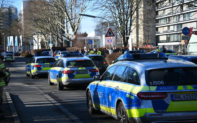 Illustrative: Police vehicles are parked on the grounds of Heidelberg University in Heidelberg, Germany, January 24, 2022. (R.Priebe/Pr-Video/dpa via AP) Illustrative: Police vehicles are parked on the grounds of Heidelberg University in Heidelberg, Germany, January 24, 2022. (R.Priebe/Pr-Video/dpa via AP)