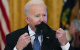 President Joe Biden arrives for a meeting on efforts to lower prices for working families, in the East Room of the White House in Washington, Monday, Jan. 24, 2022. (AP/Andrew Harnik)