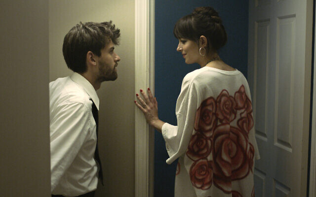 Dakota Johnson, right, appears in a scene from 'Cha Cha Real Smooth' by Cooper Raiff, an official selection of the US Dramatic Competition at the 2022 Sundance Film Festival. (Sundance Institute via AP)