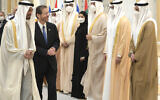 President Isaac Herzog, walks with the Crown Prince of Abu Dhabi, Sheikh Mohammed bin Zayed Al Nahyan, left, as he arrives at the royal palace, in Abu Dhabi, United Arab Emirates, Sunday, Jan. 30, 2022. (Amos Ben Gershom/GPO via AP)