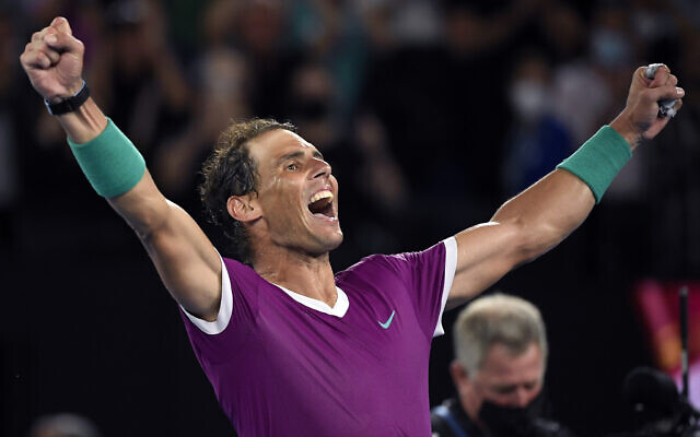 Rafael Nadal of Spain celebrates his win over Daniil Medvedev of Russia in the men's singles final at the Australian Open tennis championships in Melbourne, Australia, Jan. 31, 2022. (AP Photo/Andy Brownbill) Rafael Nadal of Spain celebrates his win over Daniil Medvedev of Russia in the men's singles final at the Australian Open tennis championships in Melbourne, Australia, Jan. 31, 2022. (AP Photo/Andy Brownbill)