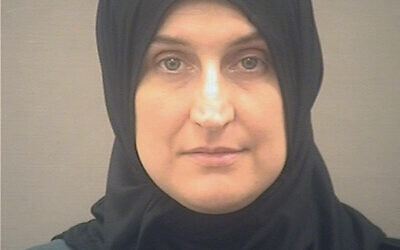 This undated photo provided by the Alexandria, Va., Sheriff's Office in January 2022 shows Allison Fluke-Ekren. Fluke-Ekren, 42, who once lived in Kansas, has been arrested after federal prosecutors charged her with joining the Islamic State group and leading an all-female battalion of AK-47 wielding militants. The U.S. Attorney in Alexandria announced Saturday, Jan. 29, 2022, that she has been charged with providing material support to a terrorist organization. (Alexandria Sheriff's Office via AP)