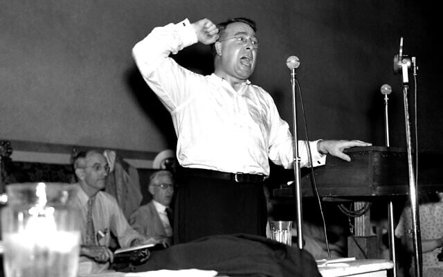 Charles E. Coughlin attacking the Roosevelt administration in a speech before the Townsend National Convention, July 17, 1936. (AP Photo)