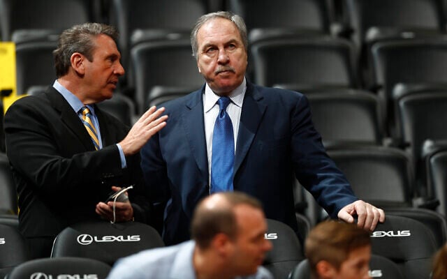 Former Washington Wizards general manager Ernie Grunfeld in the first half of an NBA basketball game, March 8, 2017, in Denver. (AP Photo/David Zalubowski)