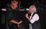 Australian soft rock duo Air Supply performs at a concert in Kuala Lumpur, Malaysia, Saturday, Aug. 17, 2013. (AP/Lai Seng Sin)