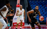 Illustrative: Members of Hapoel Beersheba play against Hapoel Jerusalem at the Balkan International Basketball League match in Jerusalem, on October 22, 2020. (Flash90)