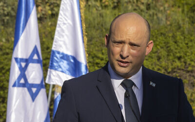 Prime Minister Naftali Bennett at the Yad Vashem Holocaust Memorial in Jerusalem on October 10, 2021. (Olivier Fitoussi/Flash90)