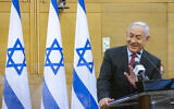 Head of opposition and of the Likud party Benjamin Netanyahu leads a faction meeting at the Knesset December 6, 2021 (Olivier Fitoussi/Flash90)