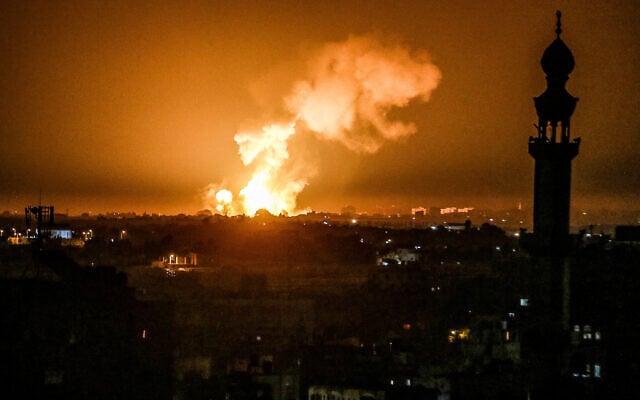 Fire and smoke rise during Israeli airstrikes in Khan Yunis, in the southern Gaza Strip, on January 2, 2022, a day after two rockets fired from Gaza landed off the coast of Tel Aviv. (Abed Rahim Khatib/Flash90) Fire and smoke rise during Israeli airstrikes in Khan Yunis, in the southern Gaza Strip, on January 2, 2022, a day after two rockets fired from Gaza landed off the coast of Tel Aviv. (Abed Rahim Khatib/Flash90)