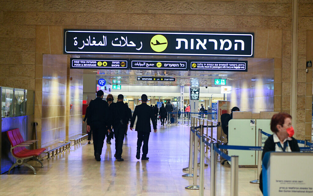 Travelers at the Departure Hall in the Ben Gurion International Airport near Tel Aviv, on January 4, 2022. (Arie Leib Abrams/Flash90) Travelers at the Departure Hall in the Ben Gurion International Airport near Tel Aviv, on January 4, 2022. (Arie Leib Abrams/Flash90)