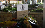 The grave of Maj. Chen Fogel, an Israeli Air Force pilot killed in a helicopter crash, is seen at the military cemetery in Haifa, on January 4, 2022. (Shir Torem/Flash90)
