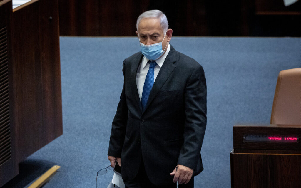 Opposition leader Benjamin Netanyahu seen at the Knesset in Jerusalem, January 5, 2022 (Yonatan Sindel/Flash90) Opposition leader Benjamin Netanyahu seen at the Knesset in Jerusalem, January 5, 2022 (Yonatan Sindel/Flash90)