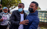 Itzhak Asefa is seen with family and friends after his release from Hermon Prison on January 16, 2022.  (David Cohen/Flash90 )