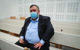 Likud MK David Bitan arrives for a court hearing at the Lod District Court, on January 19, 2022. (Avshalom Sassoni/Flash90)