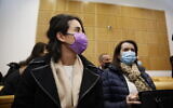 Shira Isakov arrives for a court hearing of Aviad Moshe, her ex-husband who tried to murder her in their apartment in Mitzpe Ramon, at the Beer Sheva district court, January 27, 2022. (Flash90)
