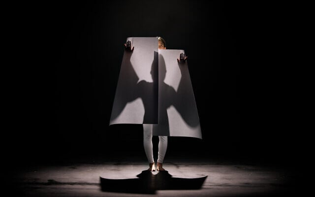 Hila Ben Ari's dancers play with paper and movement in her video homage to paper cut artist Moshe Reifer, a fellow member of Kibbutz Yagur in her childhood, and currently on exhibit at Ticho House through October 2022 (Courtesy Ticho House)