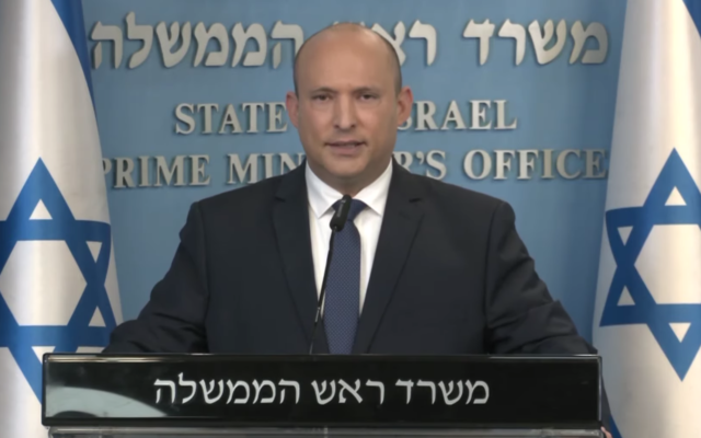 Prime Minister Naftali Bennett speaks during a press conference about the Omicron variant of coronavirus, January 2, 2021. (Screen capture/YouTube) Prime Minister Naftali Bennett speaks during a press conference about the Omicron variant of coronavirus, January 2, 2021. (Screen capture/YouTube)