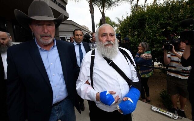 Rabbi Yisroel Goldstein, right, walks with Poway mayor Steve Vaus, left, as he arrives for a news conference at the Chabad of Poway synagogue, shortly after a deadly shooting at the congregation, April 28, 2019. (AP Photo/Denis Poroy) Rabbi Yisroel Goldstein, right, walks with Poway mayor Steve Vaus, left, as he arrives for a news conference at the Chabad of Poway synagogue, shortly after a deadly shooting at the congregation, April 28, 2019. (AP Photo/Denis Poroy)