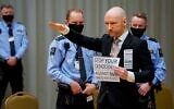 Anders Behring Breivik makes a Nazi salute as he arrives on the first day of the trial where he is requesting release on parole, on January 18, 2022 at a makeshift courtroom in Skien prison, Norway. (Ole Berg-Rusten / NTB / AFP)