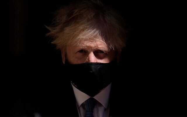 British Prime Minister Boris Johnson leaves 10 Downing Street to attend the weekly Prime Minister's Questions at the Houses of Parliament, in London, June 23, 2021. (AP Photo/Matt Dunham, File) British Prime Minister Boris Johnson leaves 10 Downing Street to attend the weekly Prime Minister's Questions at the Houses of Parliament, in London, June 23, 2021. (AP Photo/Matt Dunham, File)