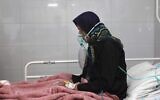 A COVID-19 patient in a hospital in the city of Qom, Iran, September 15, 2021. (AP Photo/Vahid Salemi)