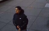 The suspect in a hate crime against a Jewish man in Brooklyn in footage released by the NYPD. (Screenshot)
