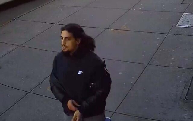The suspect in a hate crime against a Jewish man in Brooklyn in footage released by the NYPD. (Screenshot) The suspect in a hate crime against a Jewish man in Brooklyn in footage released by the NYPD. (Screenshot)