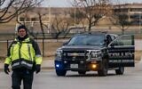 A law enforcement officer walks across an intersection near the Congregation Beth Israel synagogue on January 15, 2022 in Colleyville, Texas. (Brandon Bell/Getty Images/AFP)