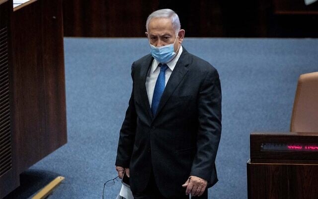 Opposition leader Benjamin Netanyahu at the Knesset in Jerusalem, on January 5, 2022. (Yonatan Sindel/Flash90) Opposition leader Benjamin Netanyahu at the Knesset in Jerusalem, on January 5, 2022. (Yonatan Sindel/Flash90)