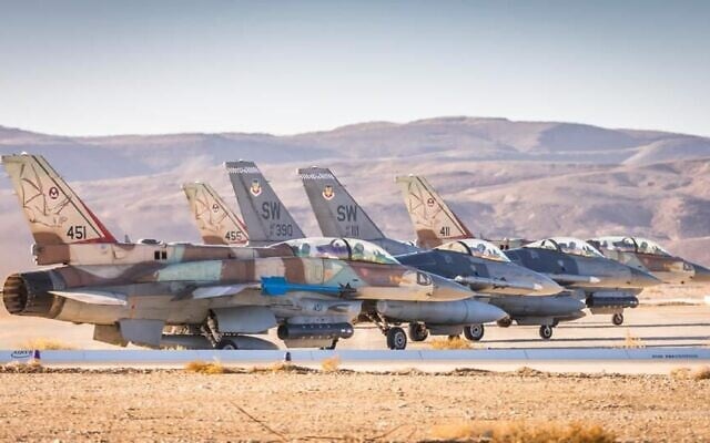 Israeli and American F-16 fighter jets sit together on a runway in the Ovda Air Base during a joint exercise in southern Israel in January 2022. (Israel Defense Forces)