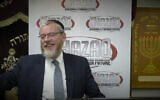 Rabbi YY Rubinstein speaks at a charity in New York City, Aug, 5, 2019. (Chazaq/YouTube via JTA)