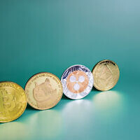A visual representation of cryptocurrencies Bitcoin, Ripple XRP, Dogecoin, and Ethereum. (Salarko via iStock by Getty Images)