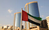 A flag of the United Arab Emirates in flies in Dubai. (typhoonski via iStock by Getty Images)